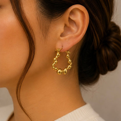 Gold Wavy Stainless Steel Hoop Earrings
