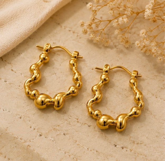 Gold Wavy Stainless Steel Hoop Earrings