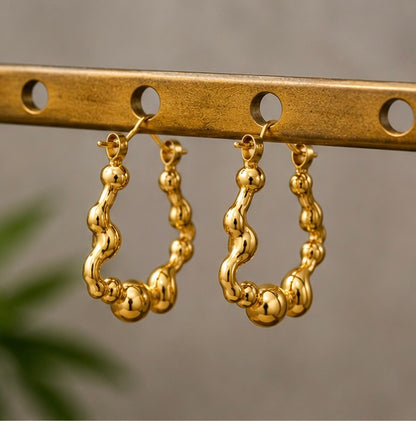 Gold Wavy Stainless Steel Hoop Earrings