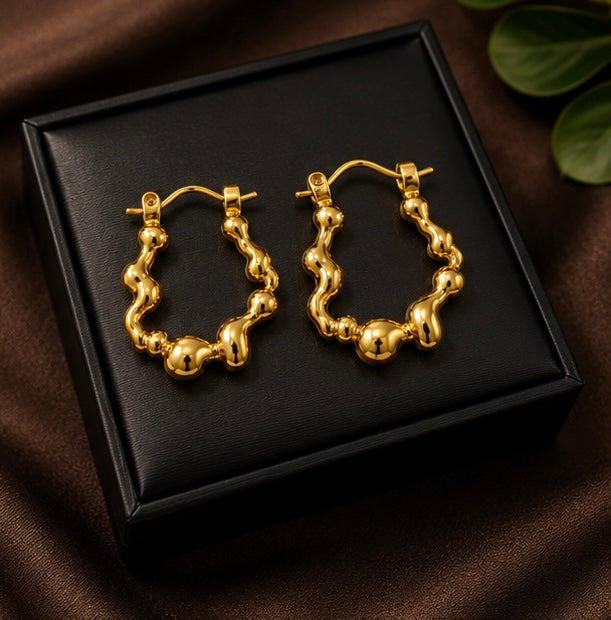 Gold Wavy Stainless Steel Hoop Earrings